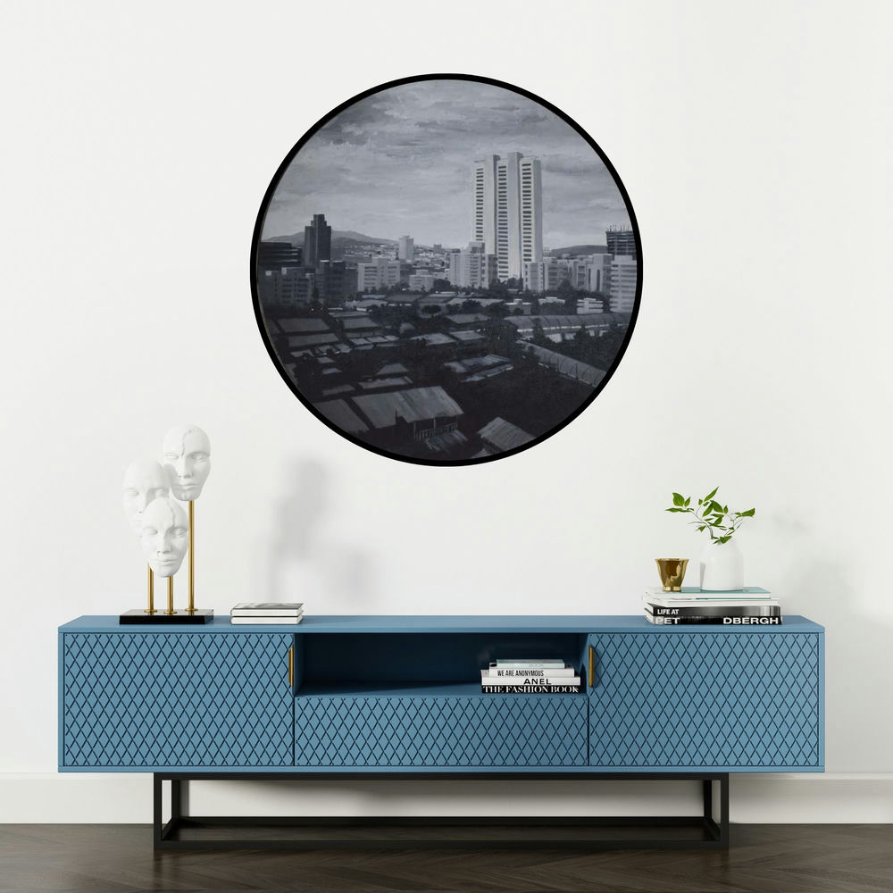 'Untitled 4 (Cityscape in a Circle)' painting by Ritesh Chopda shown on a wall in a furnished room.