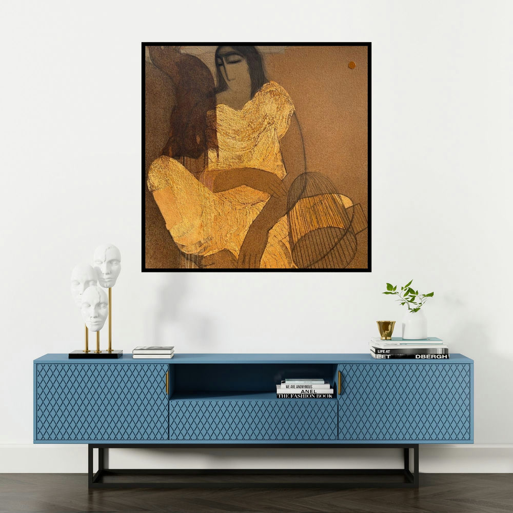 'Village Women (Golden Solitude)' painting by Siddharth Shingade shown on a wall in a furnished room.