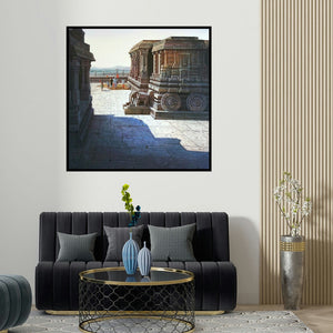 Pravin Pasare's 'Vitthala Temple Hampi 4 (Hampi Stone Chariot)' painting visualized above a sofa in a contemporary room.