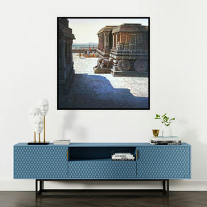 'Vitthala Temple Hampi 4 (Hampi Stone Chariot)' painting by Pravin Pasare shown on a wall in a furnished room.