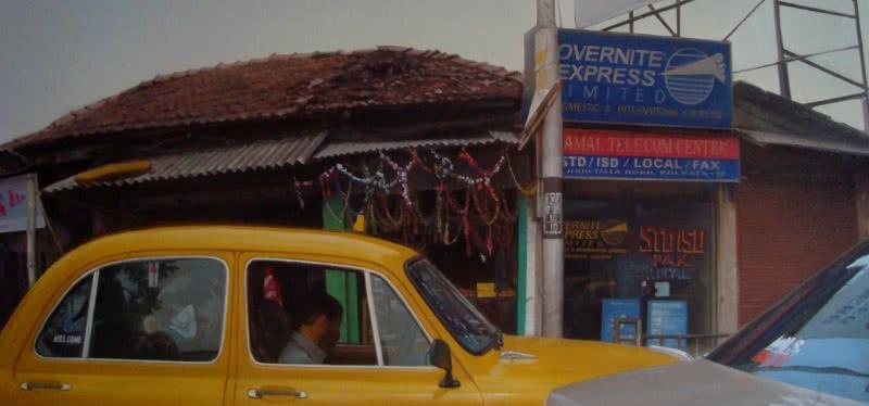 Cityscape oil painting titled 'Wind Of Change2', 24x48 inches, by artist Anupam Halder on Canvas