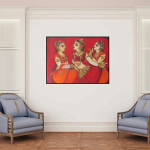 'Women Gossiping (Village Chatter)' painting by Rahul Phulkar shown on a wall in a furnished room.