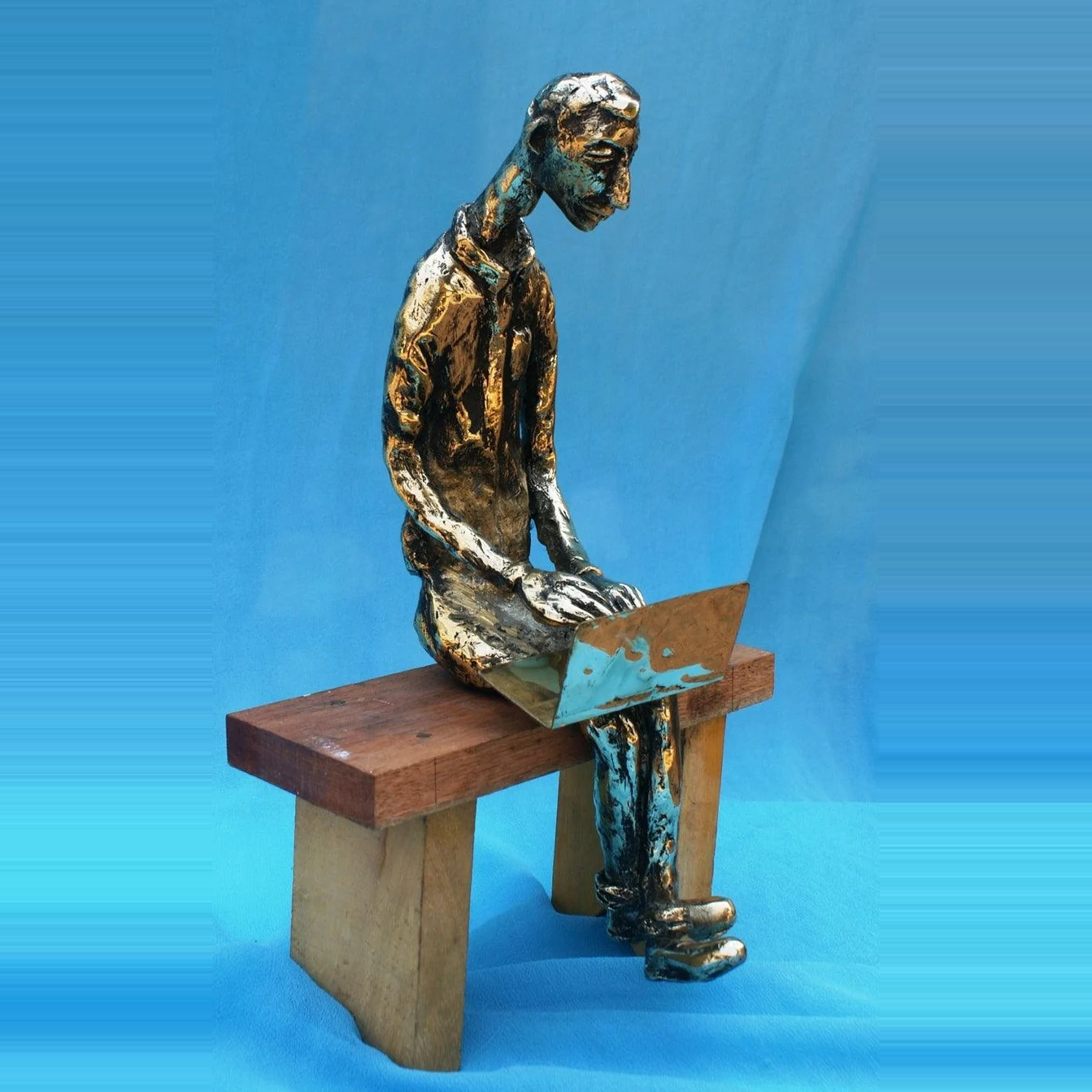 The laptop boy figurative sculpture
