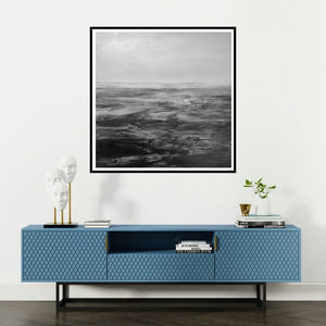 '4 (The Edge of Perception)' painting by Manish Sharma shown on a wall in a furnished room.