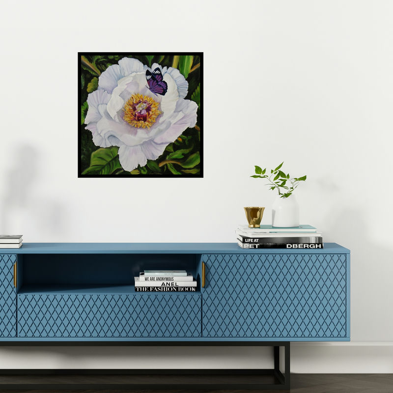 Preview of 'White Flower With Butterfly (Golden Radiance)' Painting by Sulakshana Dharmadhikari shown on a wall in a furnished room.