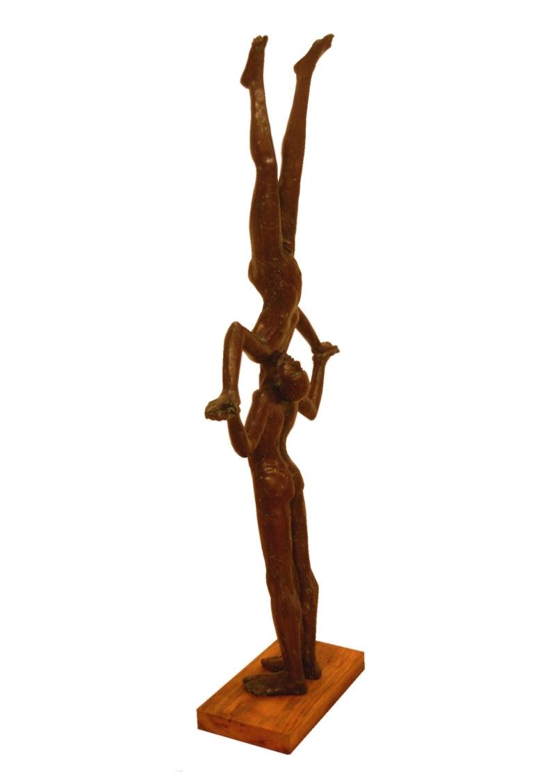 Figurative sculpture titled 'Balance', 28x12x8 inches, by artist Rakesh Sadhak on Bronze
