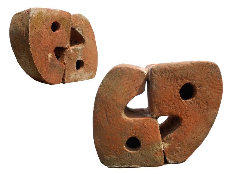 Abstract sculpture titled 'Chit Chat', 14x16x8 inches, by artist Souvik Das on Terracotta