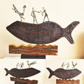 Figurative sculpture titled 'Fisherman', 17x23x4 inches, by artist Renu Bala on Wood, Metal