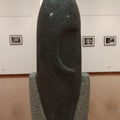 Religious sculpture titled 'Ganesha', 18x8x8 inches, by artist Hariram Phad on Black Basalt Stone