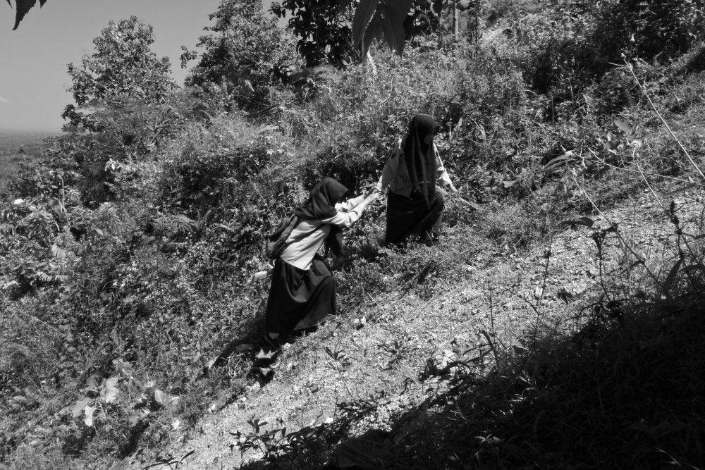 Photorealistic photography titled 'Help', 11x17 inches, by artist Rahmat Nugroho on