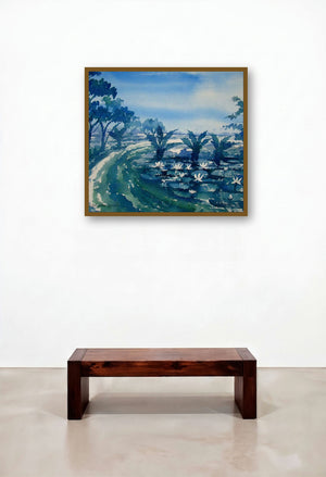 Landscape (Tranquil Waterside) by artist Jiaur Rahman displayed in a Luxury Reception Area