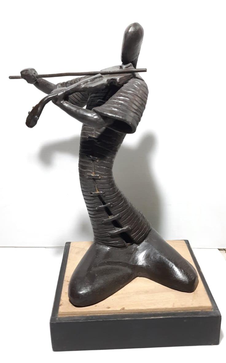 Figurative sculpture titled 'Musician', 12x9x6 inches, by artist Subrata Paul on Bronze