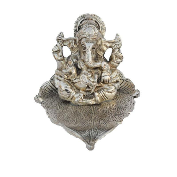 Silver Lord Ganesha Statue On Leaf Handicraft by E Craft | ArtZolo.com