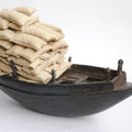 Still-life sculpture titled 'Still Life', 10x14x7 inches, by artist Tarun Maity on Bronze, Rice Bag