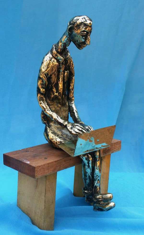 The Laptop Boy Sculpture by Usha Ramachandran | ArtZolo.com