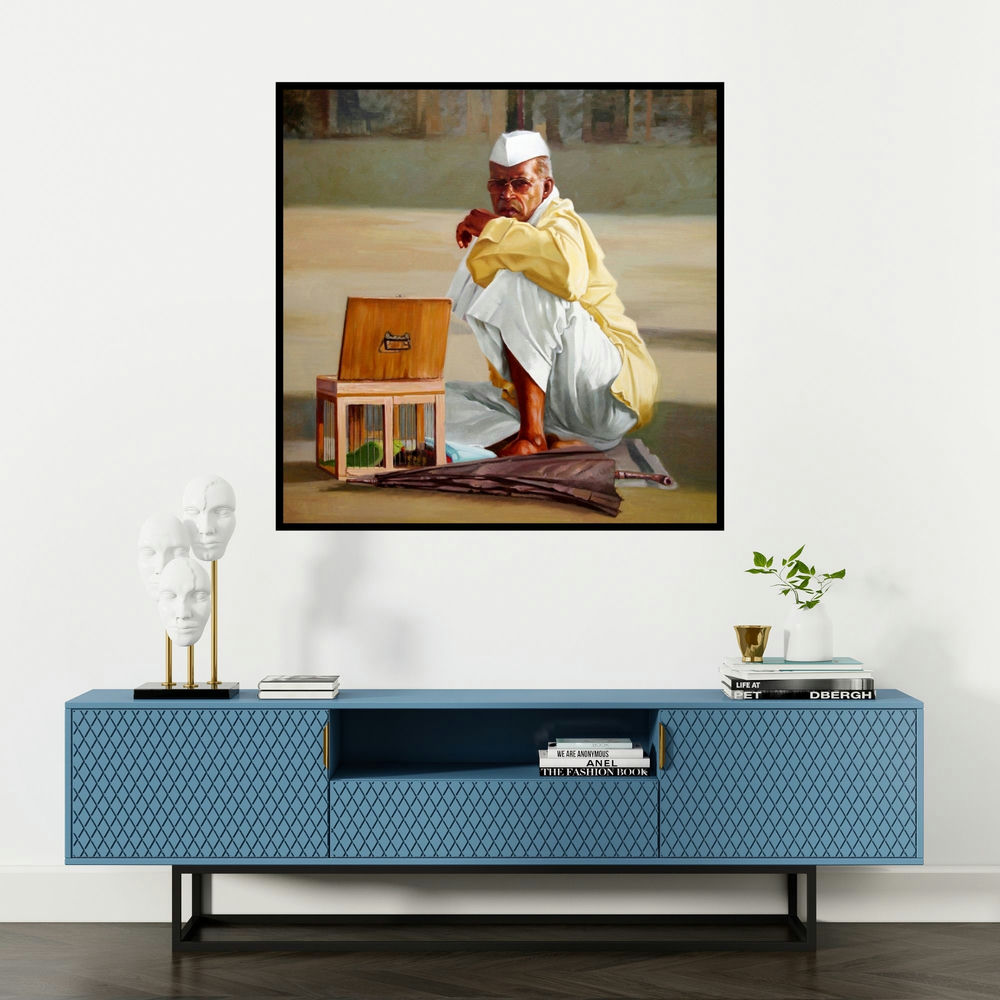 'Astrologer' painting by Vinayak Takalkar shown on a wall in a furnished room.
