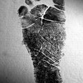 Figurative photography titled 'Babys Stamp Foot', 15x11 inches, by artist Rahmat Nugroho on