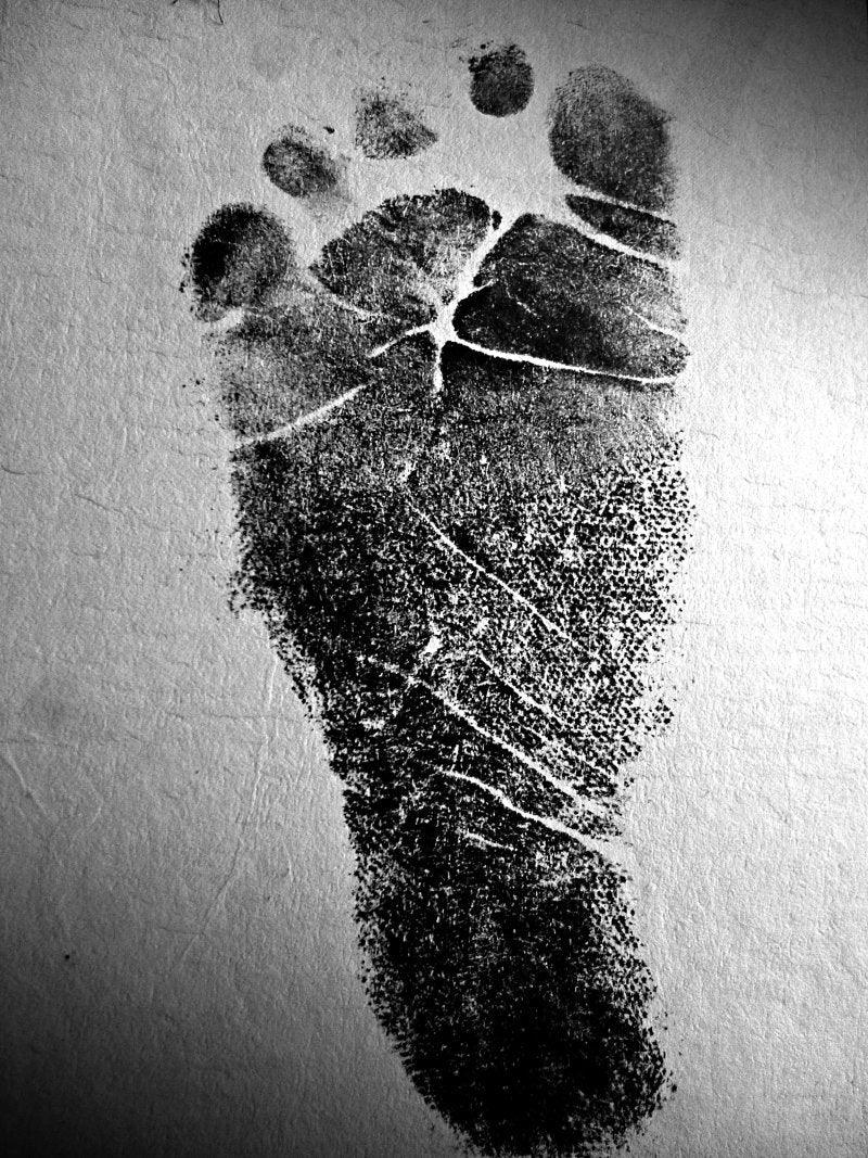 Figurative photography titled 'Babys Stamp Foot', 15x11 inches, by artist Rahmat Nugroho on