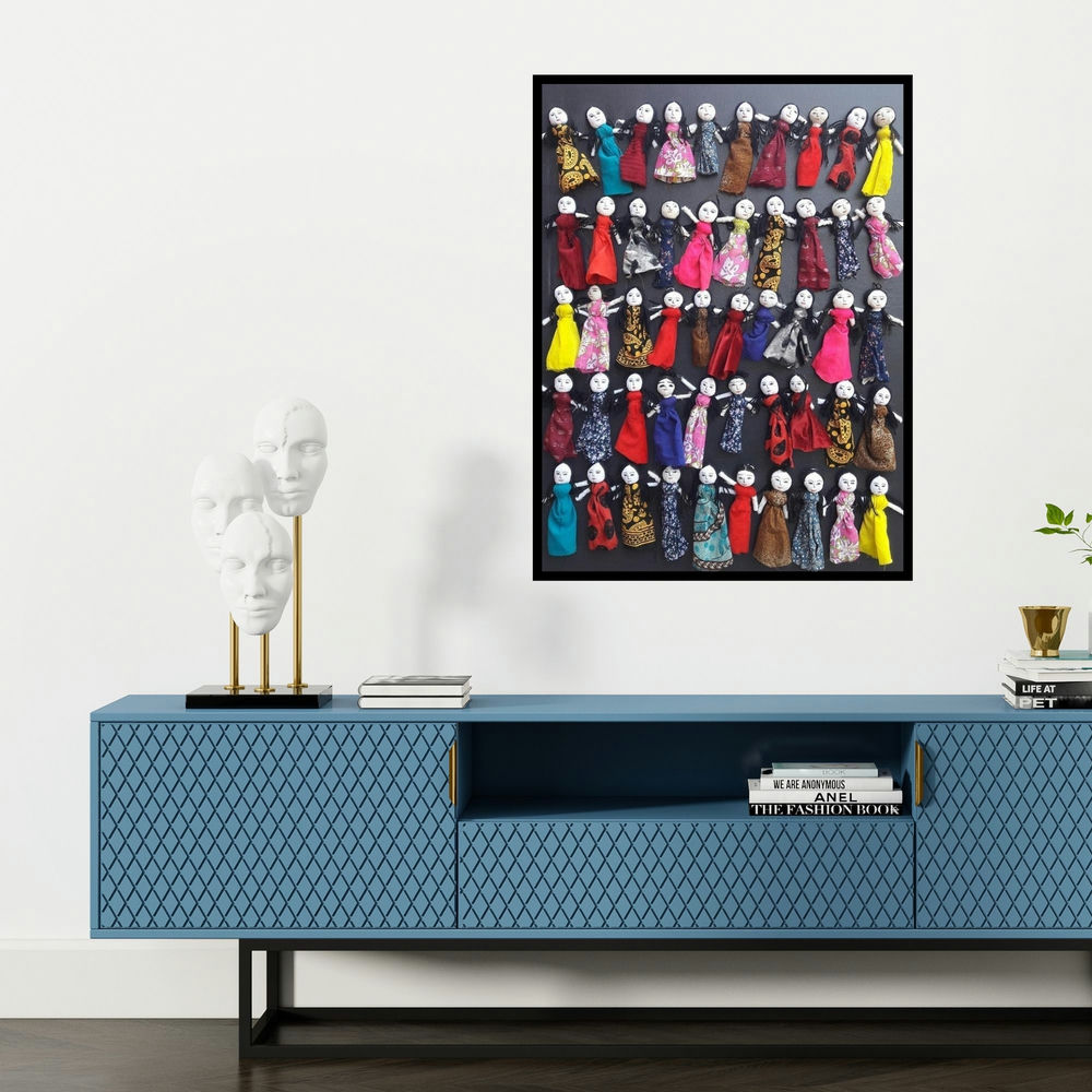 'Bachpan (A Collection of Cloth Dolls)' painting by Pranita Das shown on a wall in a furnished room.