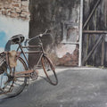 Transportation watercolor painting titled 'BiCycle and Blue wall', 22x15 inches, by artist Mrutyunjaya Dash on paper