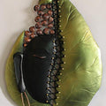 Religious craft titled 'Buddha In Leaf', 15x10 inches, by artist Nitesh on Wrought Iron