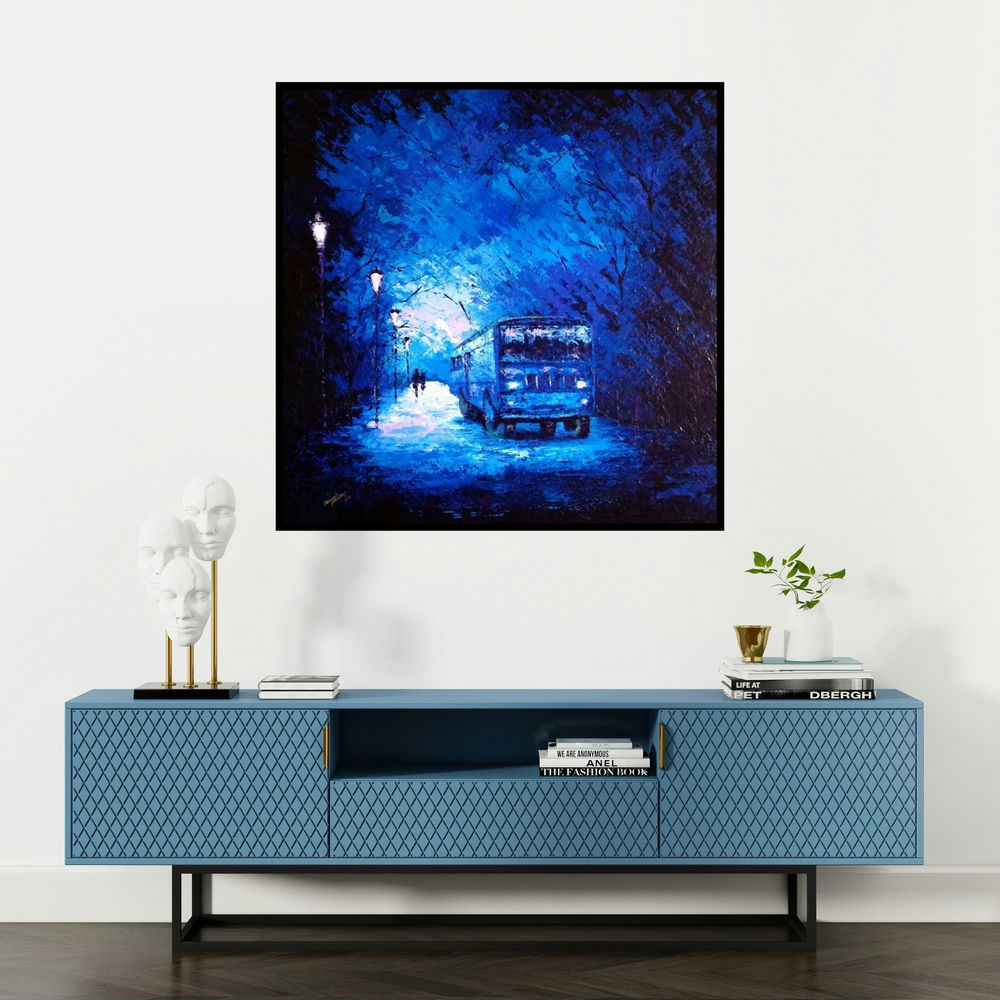 'The Bus Ride' painting by Ganesh Panda shown on a wall in a furnished room.