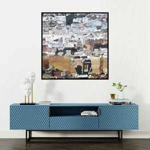 'Cityscape 1 (Urban Grid)' painting by Ganesh Pokharkar shown on a wall in a furnished room.