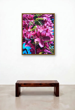 Clad In Pink (Pink Floral Watercolor) by artist Shagufta Mehdi displayed in a Industrial Reception Area