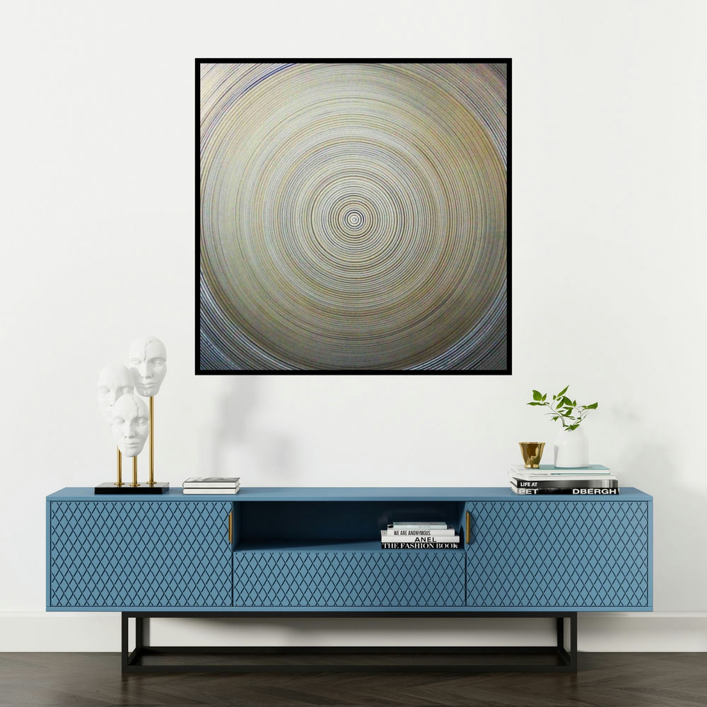 'Concentration One (Cosmic Contemplation)' painting by Ghanshyam Gupta shown on a wall in a furnished room.