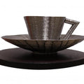Still-life sculpture titled 'Cup And Saucer', 20x24x24 inches, by artist Ram Kumbhar on Stainless Steel