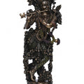 Religious handicraft titled 'Dancing Lord Krishna Playing Flute', 14x6x4 inches, by artist Brass Handicrafts on Polyresin, Bronze
