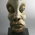 Figurative sculpture titled 'Distortion Of The Face 1', 9x7x8 inches, by artist Sucharita Adhikary on Wood