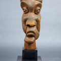 Figurative sculpture titled 'Distortion Of The Face 2', 14x5x4 inches, by artist Sucharita Adhikary on Wood