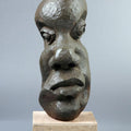 Figurative sculpture titled 'Distortion Of The Face 5', 9x7x8 inches, by artist Sucharita Adhikary on Wood