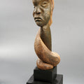 Figurative sculpture titled 'Distortion Of The Face 7', 15x3x4 inches, by artist Sucharita Adhikary on Wood