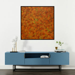 'Existence (Autumns Embrace)' painting by Roy K John shown on a wall in a furnished room.