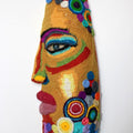 Figurative sculpture titled 'Face 12', 21x9x6 inches, by artist Archana Rajguru on Mixed Media