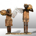 Lifestyle sculpture titled 'Fantasy 1', 53x32x20 inches, by artist Indira Ghosh on wood and metal scrap