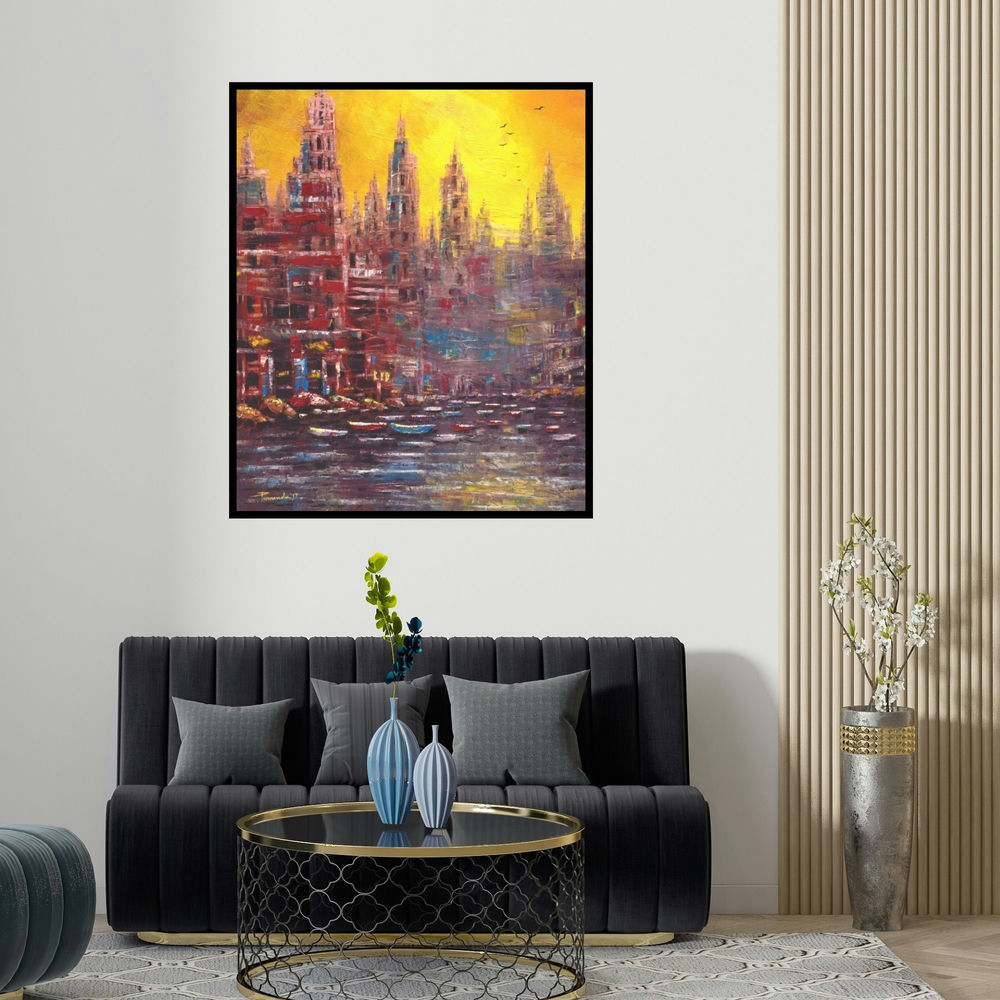 'First Lite (City of Spires)' painting by Purnendu Mandal shown on a wall in a furnished room.