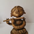 'Flute Player' figurative Bronze sculpture by artist G Subramanian, 9x7 inch, on bronze