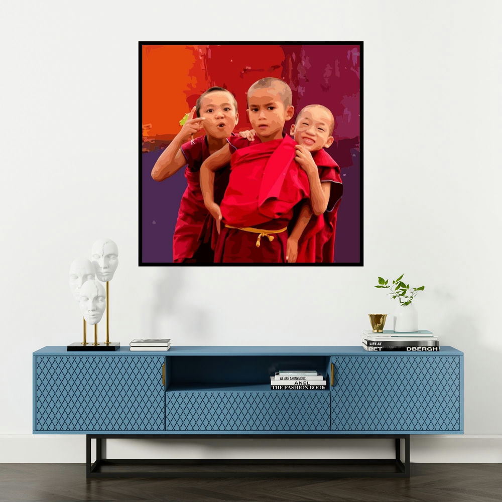 'Gnosis 14 (Three Playful Monk Kids)' painting by Umakant Tawde shown on a wall in a furnished room.