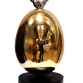 Figurative sculpture titled 'Golden Egg', 20x9x9 inches, by artist Ram Kumbhar on Mixedmedia