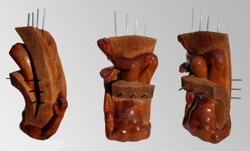 Figurative sculpture titled 'Hidden In My Life 14', 29x19x15 inches, by artist Dharam Netam on Wood, Metal