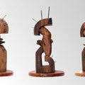 Figurative sculpture titled 'Hidden In My Life 8', 12x7x6 inches, by artist Dharam Netam on Wood, Metal