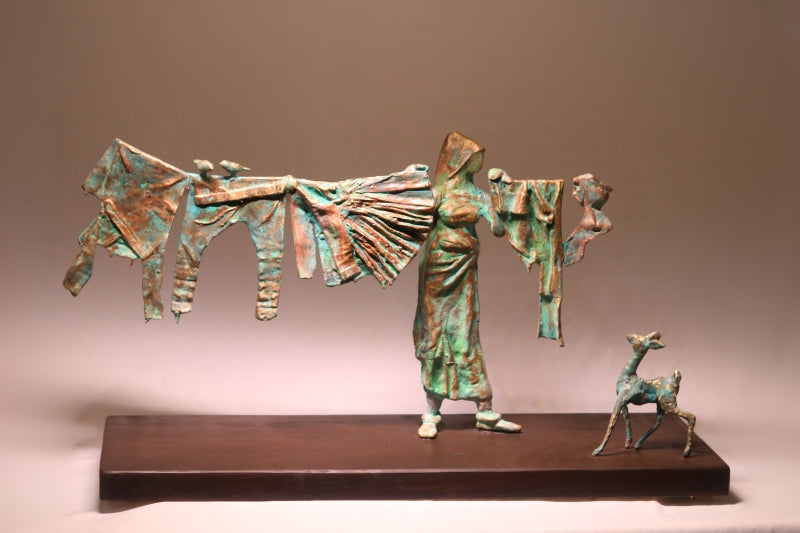 'Home Work VII' figurative Brass sculpture by artist Rohan Pawar, 16x31 inch, on brass