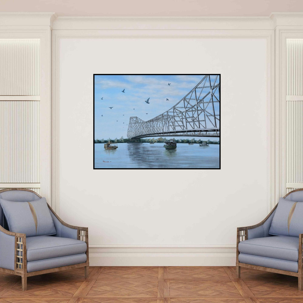 'Howrah Bridge (Majestic Howrah)' painting by Purnendu Mandal shown on a wall in a furnished room.