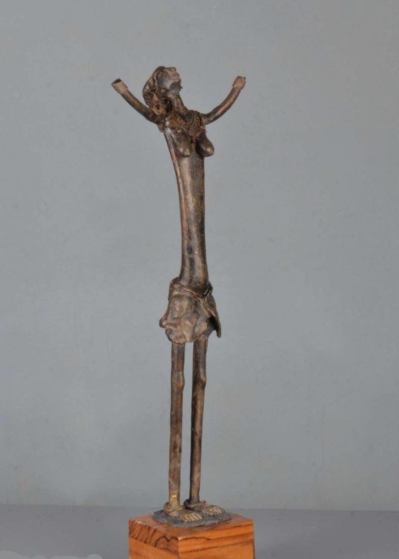 Figurative sculpture titled 'I Am Bastar', 20x7x4 inches, by artist Kishor Sharma on Bronze