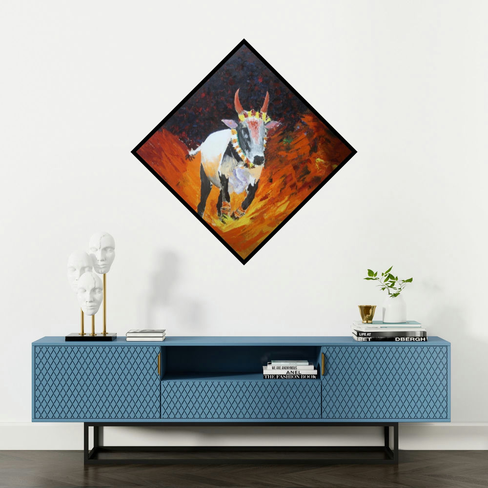 'Jallikattu' painting by Vignesh Kumar shown on a wall in a furnished room.