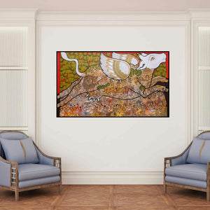 'Kamadhenu (Kamadhenu, the Celestial Cow)' painting by Ramesh Gorjala shown on a wall in a furnished room.