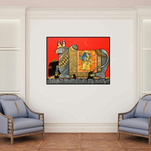 'Kamdhenu (Nandi's Divine Vision)' painting by Ashok Rathod shown on a wall in a furnished room.